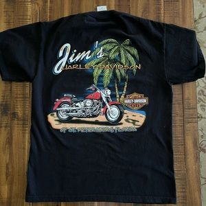 Harley Davidson T-shirt. Still plays with motorcycles. St. Petersburg,Fl Med.